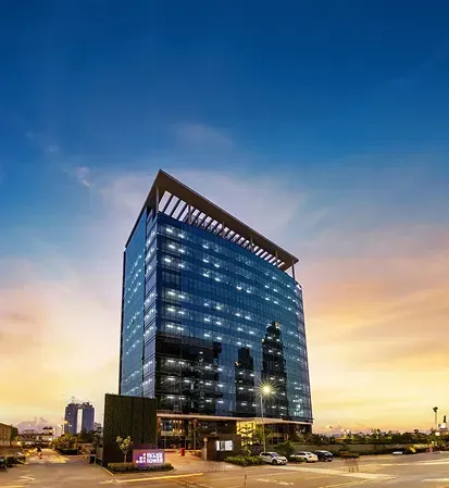 A Good Earth tower photographed at golden hour